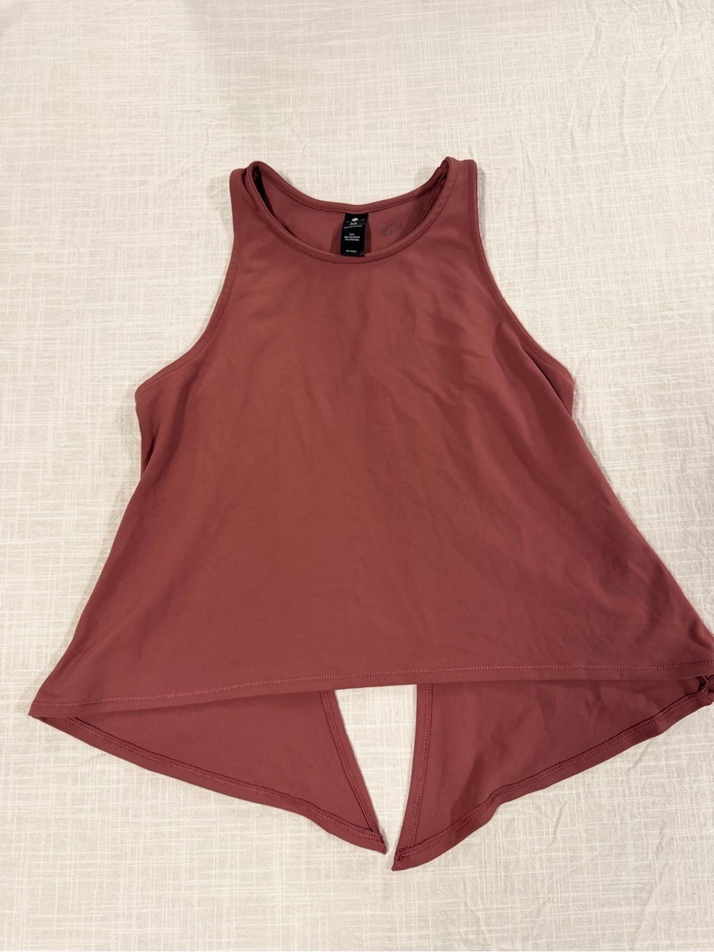 Yogalicious Mauve Split-Back High Neck Tank xs small stain on the inside.